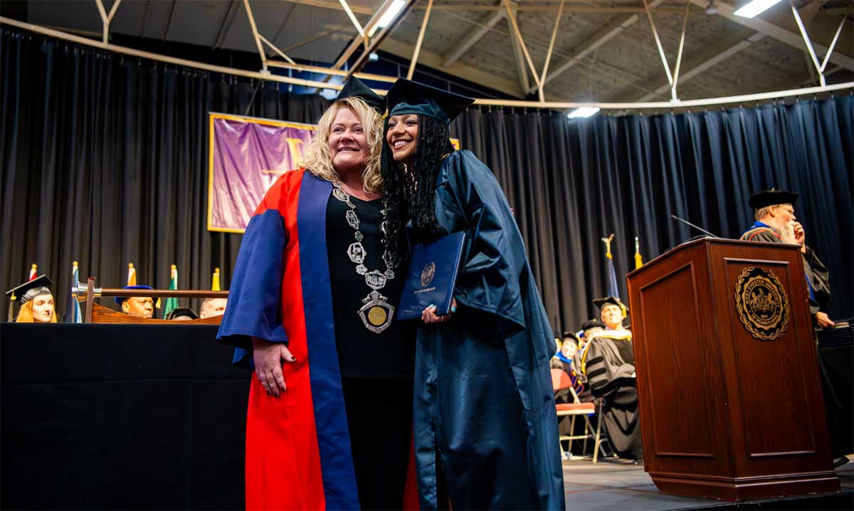 Laurie Bernotsky and New Grad Smiling